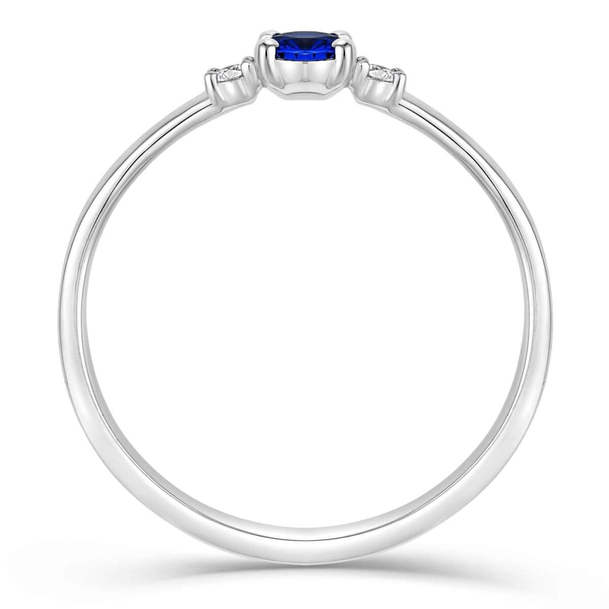 Witgouden solitair ring met blauwe saffier en diamanten